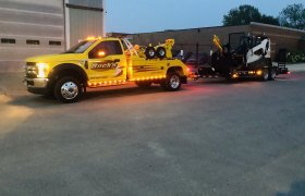 Bock's Service yellow light-duty tow truck